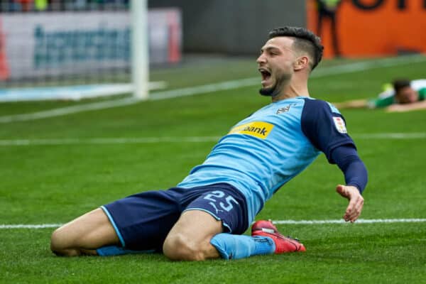 Ramy Bensebaini celebrating after scoring in a Bundesliga match