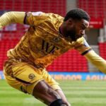Ryan Alebiosu delivering a cross for Blackburn Rovers