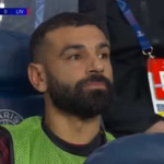 Mohamed Salah sitting on bench during PSG match