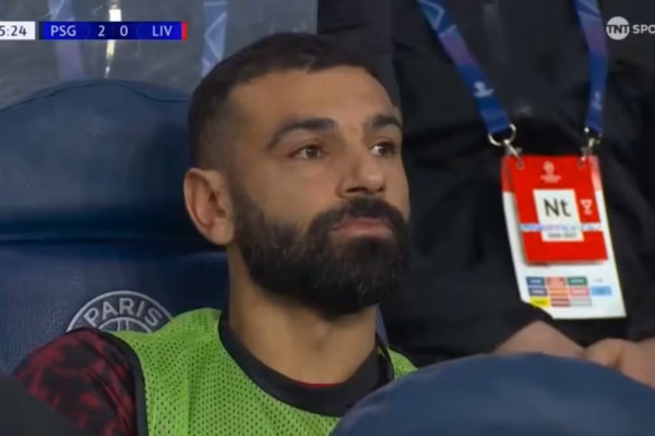 Mohamed Salah sitting on bench during PSG match