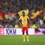 angaré celebrates with Lens supporters at Bollaert
