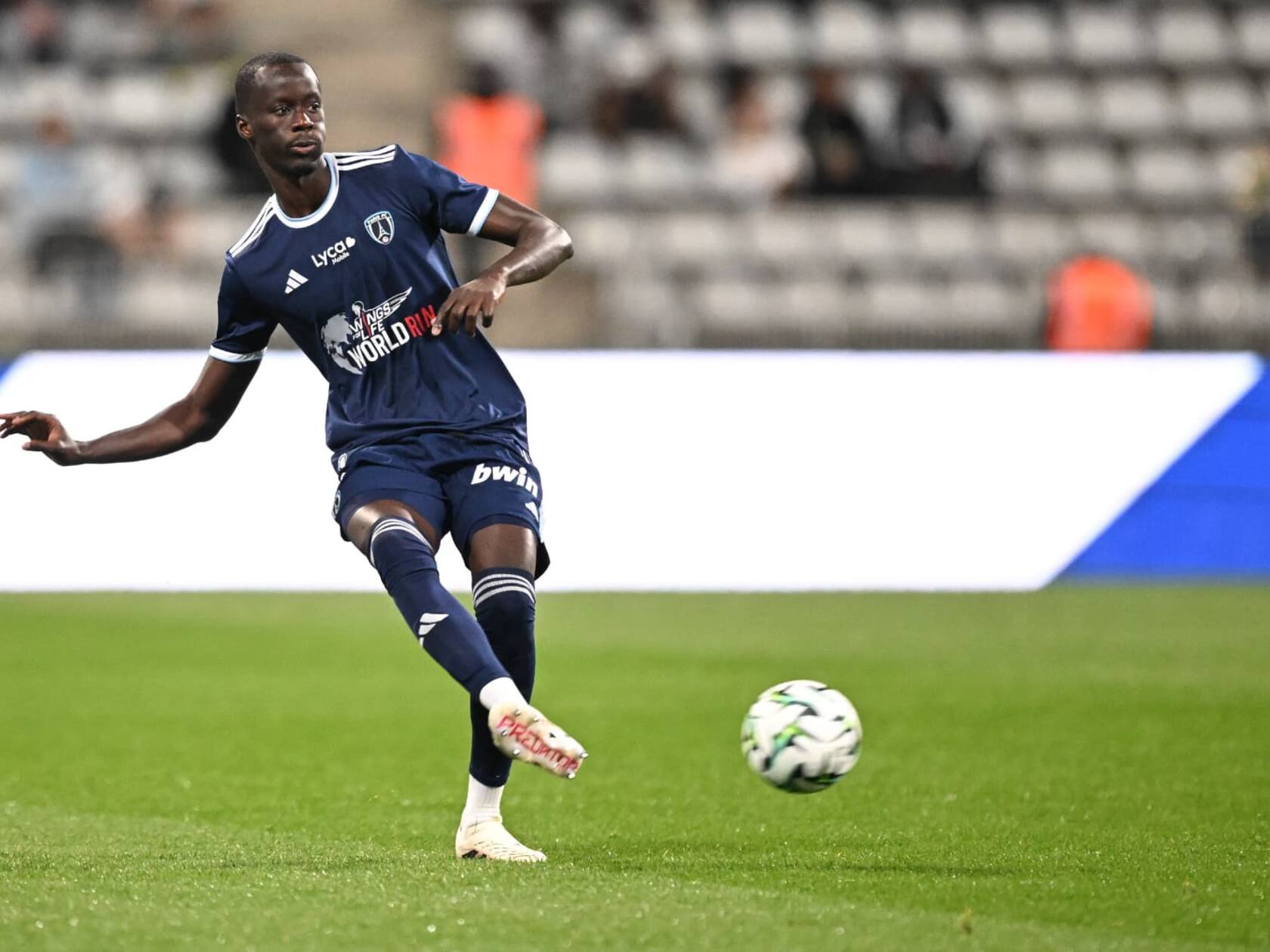 Senegalese defender Moustapha Mbow playing for Paris FC