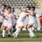 Tunisia women’s team celebrating after scoring in a friendly match