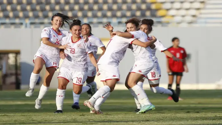 Tunisia women’s team celebrating after scoring in a friendly match