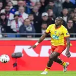 Malang Sarr playing for RC Lens making a defensive interception