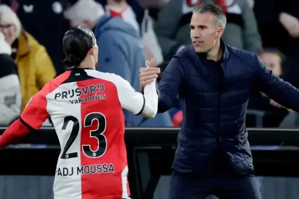 Anis Hadj Moussa embraces Robin van Persie after Feyenoord performance