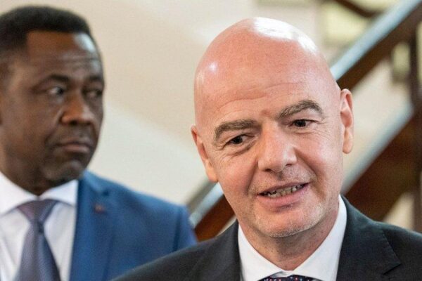 Gianni Infantino congratulates Véron Mosengo Omba after FECOFA election