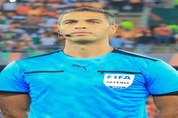 Egyptian referee Amin Omar officiating a match at the 2026 FIFA World Cup.
