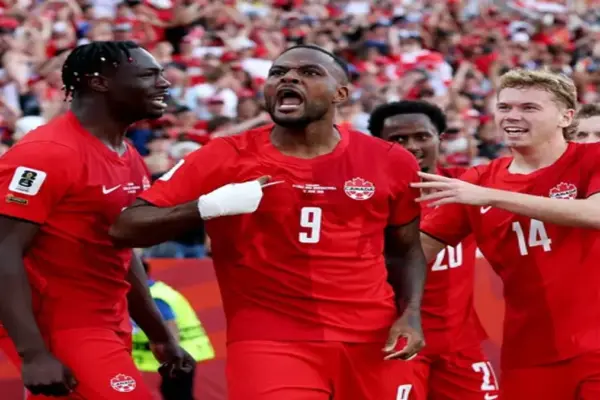 Cyle Larin celebrating his first World Cup goal for Canada against Bosnia and Herzegovina
