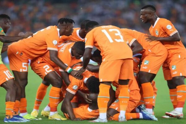 Ivory Coast players celebrating after a victory over France.