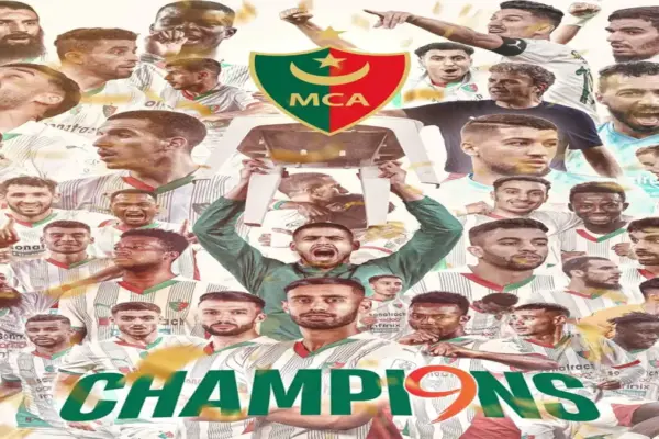 MC Alger players celebrate lifting the Ligue 1 Mobilis trophy after winning their 10th league title