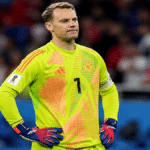 Manuel Neuer reacting after conceding a goal in a World Cup match against Paraguay