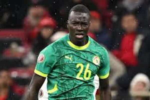 Pape Gueye celebrates after scoring for Senegal against Iraq at the 2026 World Cup.