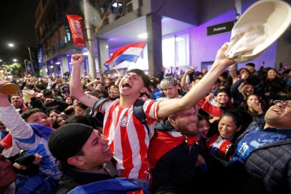Paraguay fans celebrating in Asunción after World Cup win over Germany