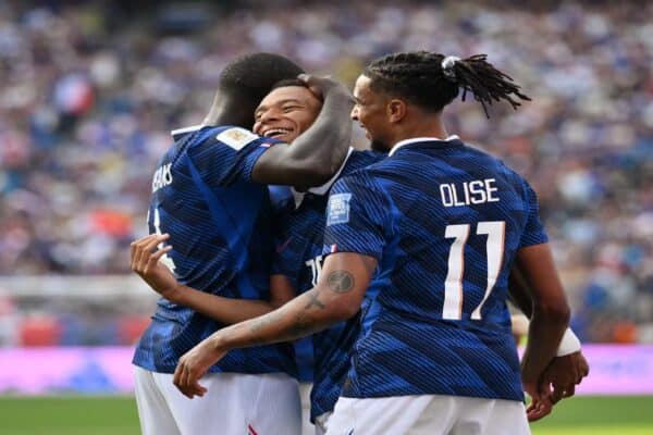 Bradley Barcola, Manu Koné and Michael Olise during France's World Cup match against Paraguay.