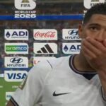 Jude Bellingham reacts after England's World Cup 2026 quarter-final as Thomas Tuchel looks on.