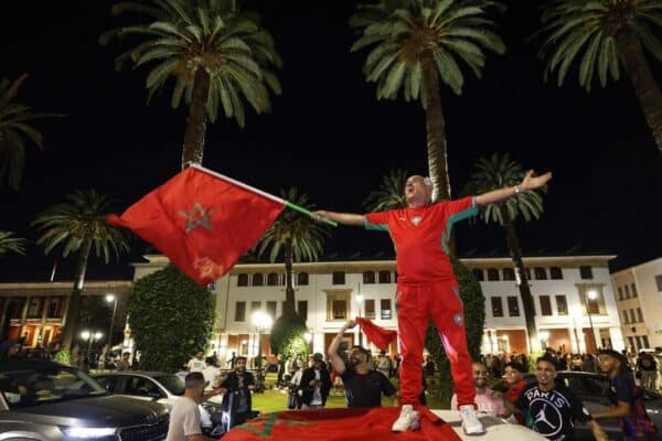 Morocco supporters celebrate after the Atlas Lions qualified for the 2026 FIFA World Cup quarter-finals.