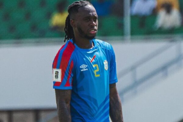 Aaron Wan-Bissaka defending against Portugal winger during World Cup match