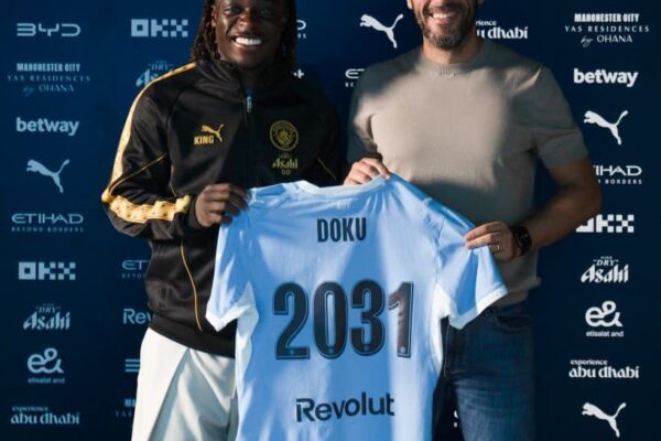 Jeremy Doku happy to extend Manchester City contract