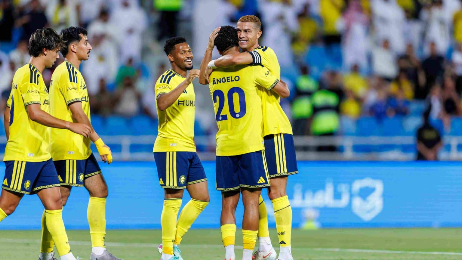 Abdullah Al Riyadh Waleed Abdullah watches Al-Nassr on his phone during Al-Diriyah game