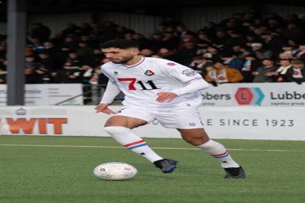 Moroccan striker Zakaria Eddahchouri in action for Deportivo La Coruña amid transfer interest from Sporting Gijón.